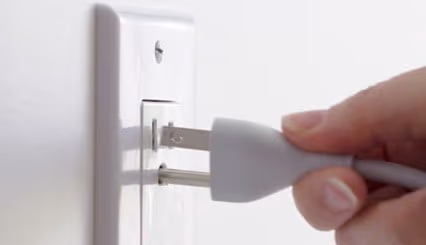 Smart TV being unplugged from wall outlet